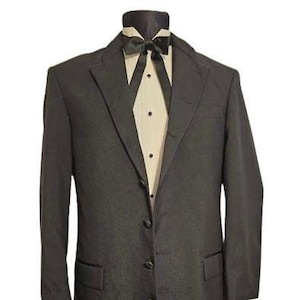 May include: A long black tuxedo jacket with a satin lapel and four buttons. The jacket has a single vent in the back and is made of a smooth fabric.