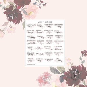 May include: A sheet of holiday-themed planner stickers with various script phrases, including "Valentine's Day," "Christmas," and "My Birthday." The stickers are in a handwritten style, with a floral background.
