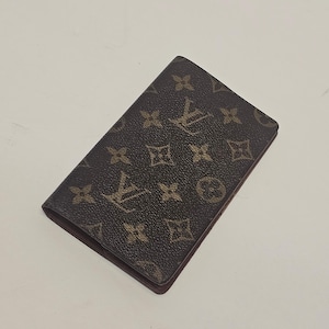 Funda tipo agenda con porta chequera Monogram de Louis Vuitton auténtica