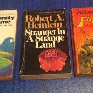 Humanity Prime, by Bruce McAllister, Stranger In A Strange Land, by Robert A. Heinlein, Fire Time, by Paul Anderson