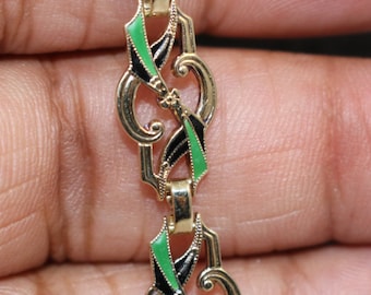 Bracelet,Enamel. 14k yellow gold, circa 1940's