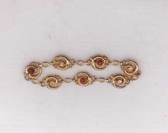 Bracelet,10k gold. Garnets. Handmade