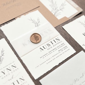 May include: Wedding invitation suite with a white background and black text. The invitation features a simple floral design and the text "AUSTIN REID MAXWELL" and "SATURDAY, SEPTEMBER 27TH 2022 AT 4 O'CLOCK IN THE AFTERNOON BOGLE FARM 1785 HARMAN ROAD | GREENVILLE, GA 30222 DINNER AND DANCING TO FOLLOW". The RSVP card features the text "RSVP BY AUGUST 25TH".