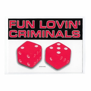 May include: A sticker featuring two red dice with white dots. The dice are positioned below the text "FUN LOVIN' CRIMINALS" in red letters on a black background. The words "(actual size)" are below the dice.