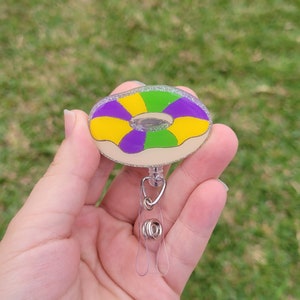 Mardi gra kings cake badge reel