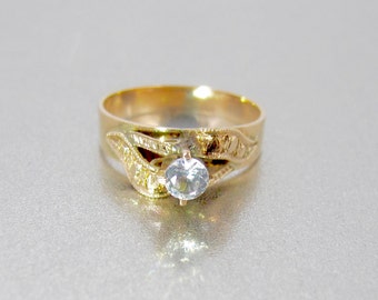 Anillo solitario antiguo de oro rosa de 10 quilates con espinela transparente: diseño de espirales en la banda ancha.