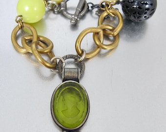 Extasia Green Glass Cameo Charm Bracelet: Intaglio Toggle Closure