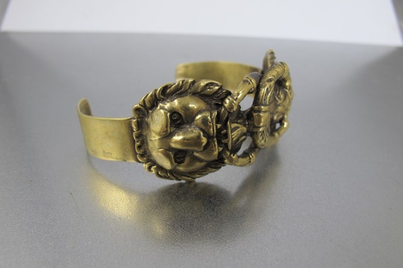 Double lion head bracelet deals