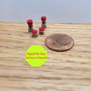 May include: Four miniature glass jars with red lids and white labels. The jars are about the size of a US quarter.