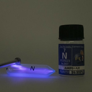 Pure Nitrogen Gas Ampoule Element Sample Low Pressure in Labeled Glass Bottle
