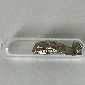 Strontium Metal Dendritic Crystals 1 Gram 99.99% Clean in Argon in a Ampoule in a labeled Glass Vial/Bottle