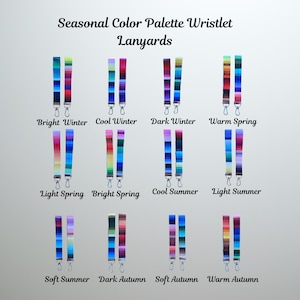 May include: A collection of wristlet lanyards in various color palettes, labeled for different seasons. Each lanyard features a colorful striped design with a silver-tone clasp. The text "Seasonal Color Palette Wristlet Lanyards" is at the top.