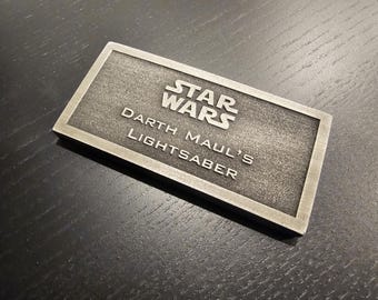 Darth Maul's lightsaber name plate placard