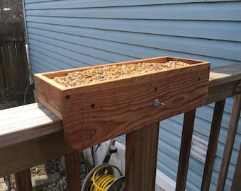 Cedar Platform bird feeder.  No mounting required, slips over a standard 2"x 6" or 1" x  6" porch or deck rail.
