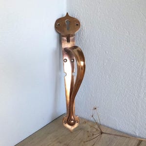 Antique bronze thumb latch door handle by Gibbons, Art Nouveau style late Victorian / Edwardian period door furniture, architectural salvage