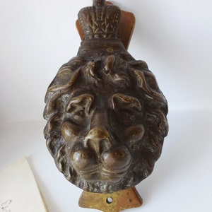 Antique doorknocker, brass lion head with crown door knocker, old patina, built in strike plate / fixing plate. Period front door furniture image 3