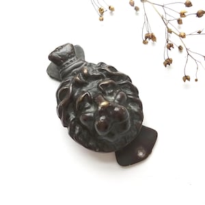 Antique doorknocker, brass lion head with crown door knocker, old patina, built in strike plate / fixing plate. Period front door furniture