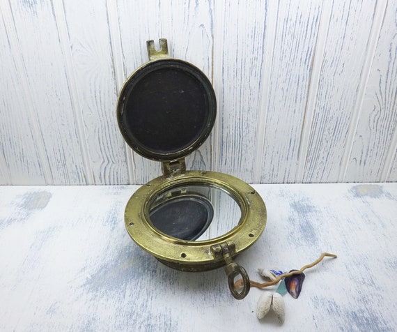 Antique Bronze Porthole With Mirror Each Side And Storm Cover Antique Bronze Porthole With Mirror