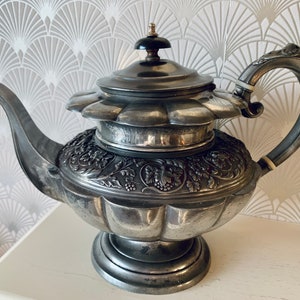 An antique Dixon & Sons pewter 9 cup teapot. c1850.