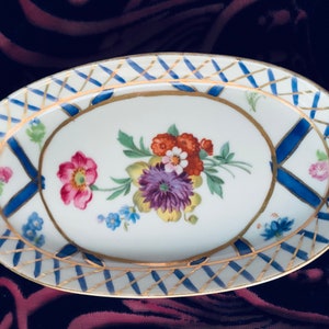 A vintage Porcelaine Royale oval trinket or pin dish, with hand painted florals. The sweetest gift!