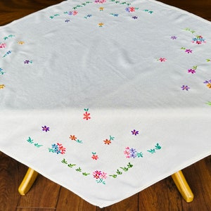A beautiful vintage hand made, hand embroidered (nearly) square tablecloth. c1950.