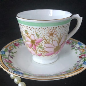 A superb vintage mismatched fine bone china set. A demitasse Tuscan China cup and a Duchess China saucer. c 1930.
