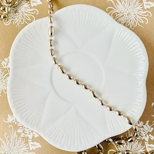 A Shelley &#39;Dainty White&#39; fine bone china breakfast saucer. So collectible! Made between 1925-1940.