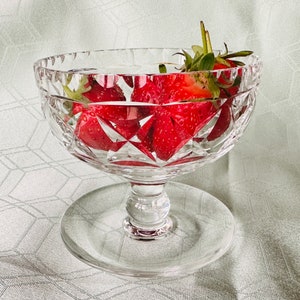 A vintage cut glass sundae dish - perfect for trifle or any delicious dessert! Strawberries and cream maybe.
