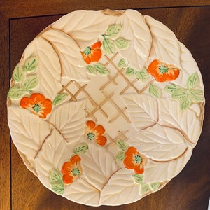 This lovely hand painted textured majolica floral dish is Bewley china c1930.