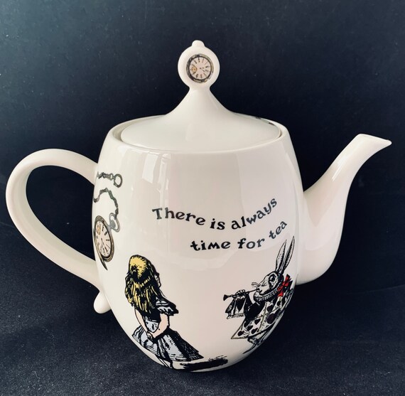 A Delightful Alice in Wonderland Themed 9 Cup Teapot for a Etsy