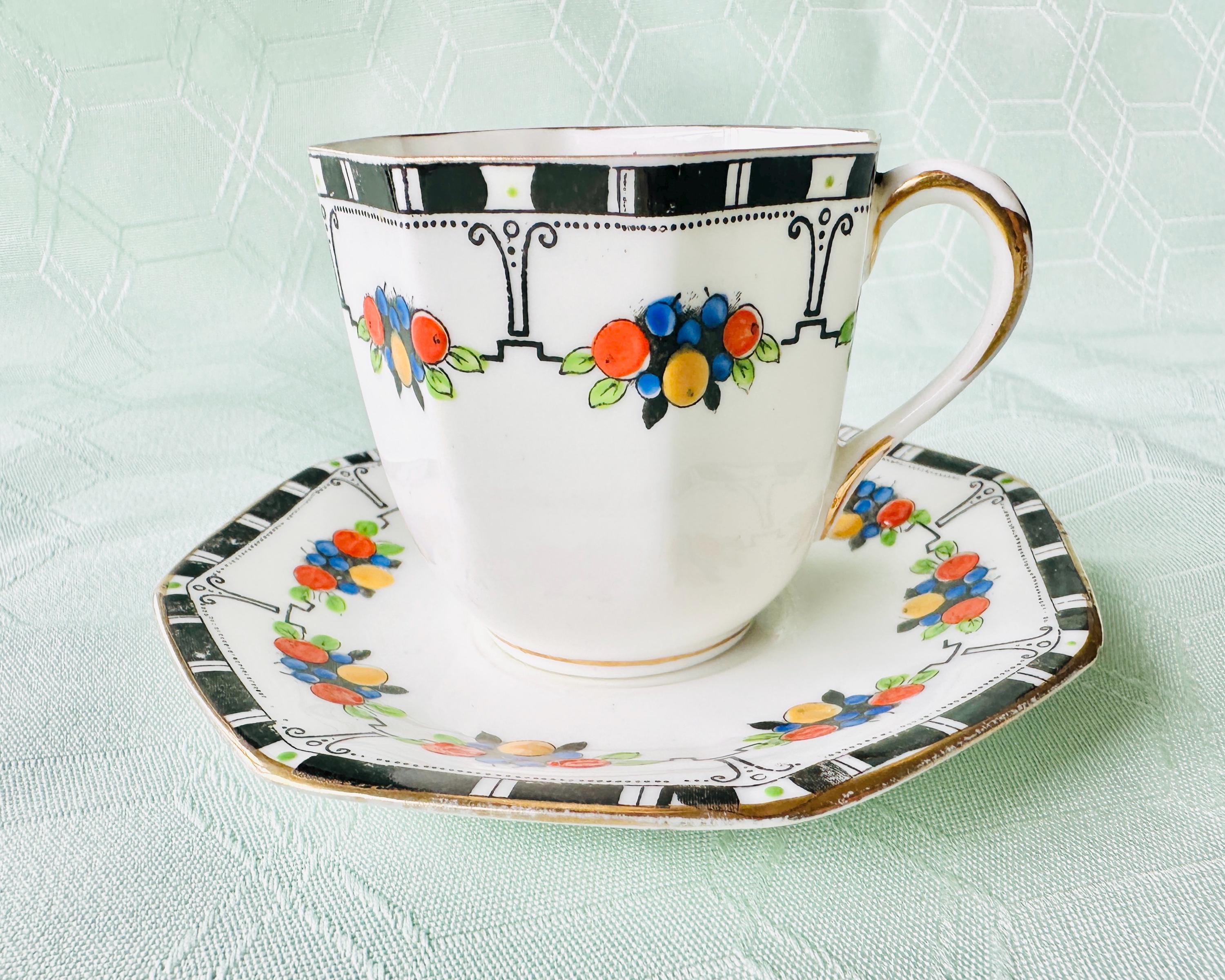 A Vintage Fine Bone China Octagonal Coffee Cup and Saucer