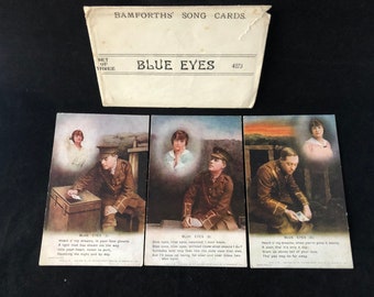 A set of 3 original  World War l song cards -&#39;Blue Eyes’ (4873). Made by Bamforths of Holmfirth, England. c1914.