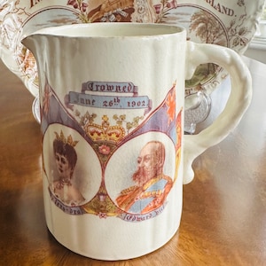 This small antique jug commemorates the coronation of Edward VII and his wife Alexandra in Westminster Abbey, 1902.