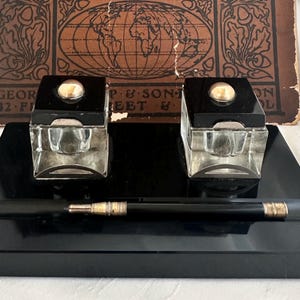 A vintage Art Deco (Montblanc?) black glass and crystal double ink well. A great present for someone that loves writing!