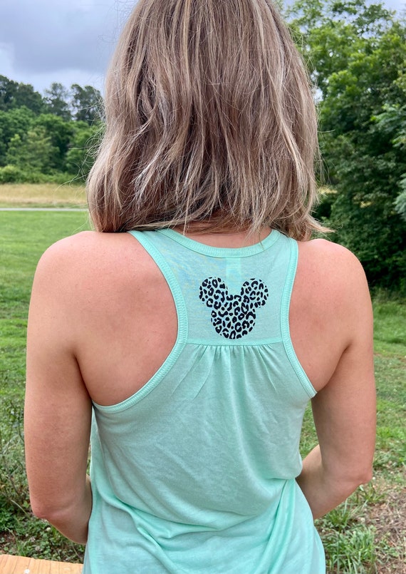 トップス Disney SCATTERED PRINT TOP Ameri（アメリ）の「Disney SCATTERED PRINT TOP（Tシャツ