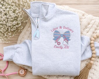 Personalized Labor and Delivery Nurse Sweatshirt, Baby Blanket Bow Quarter Zip, Custom gift RN pullover sweater, NICU Mother Baby CNA Tech