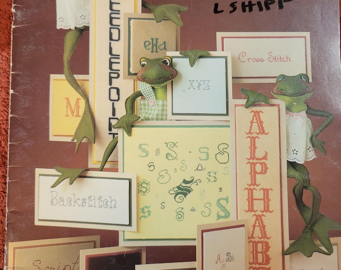 Leisure Arts Alphabet Album Cross Stitch Pattern. Free SHIPPING. Used Condition. Some writing in book.