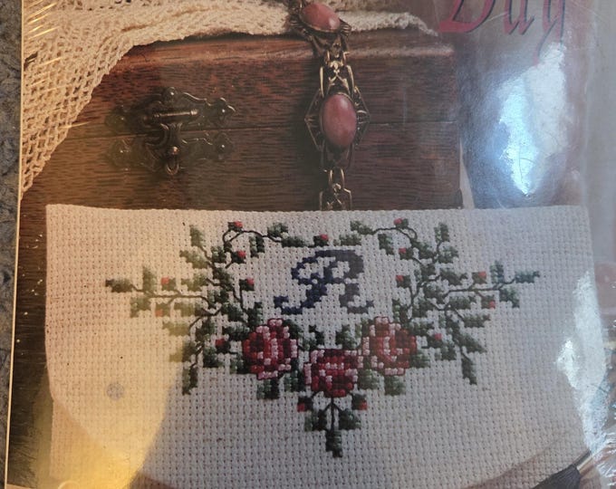 Designs for the Needle Monogram Cosmetic Bag Counted Cross Stitch Kit. FREE SHIPPING. Good Condition.