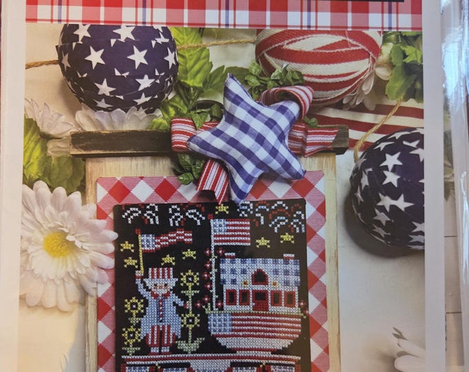 Stitching with the Housewives Americana Bakery Up on a Pedestal Cross Stitch Pattern. FREE SHIPPING. Good Condition