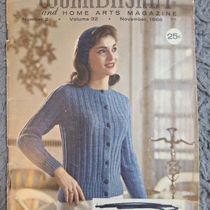 May include: Vintage magazine cover for "The Workbasket and Home Arts Magazine," featuring a woman in a blue cardigan. The magazine cover includes the text "Number 2, Volume 32, November, 1966" and a price of 25 cents.