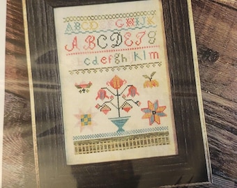 From the Heart Little Quilt Block Sampler Cross Stitch Pattern. FREE Shipping.