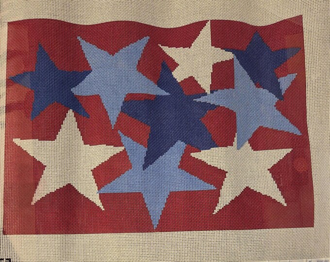 A Stitch In Time Stars on Red Needlepoint Canvas with Threads 13# 15"x10.5#. Preowned Estate Sale Like New Condition. Canvas was rolled.