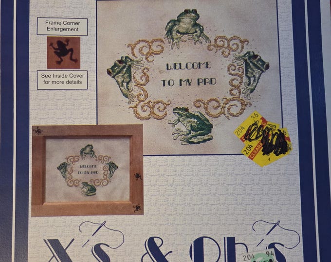 X's and Oh's Welcome Pad Cross Stitch Pattern. FREE SHIPPING. Used Condition. Price tag stickers on cover.
