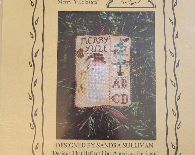 Homespun Elegance 2005 Sampler Merry Yule Santa Ornament Cross Stitch Pattern. Free Shipping. Used Condition