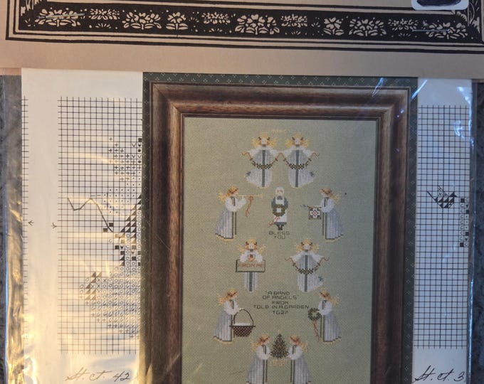 Told In A Garden A Band of Angels Cross Stitch Pattern. Good Condition. Free Shipping.