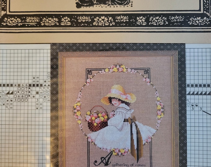 Told In A Garden A Gathering of Roses Cross Stitch Pattern. Good Condition. Free Shipping.