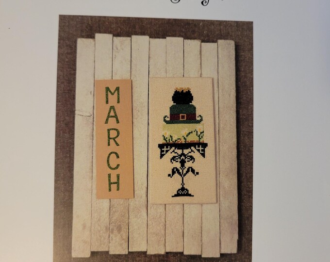 AuryTM Quaker Birthday Cakes March Cross Stitch Pattern. Free Shipping. Used Condition.