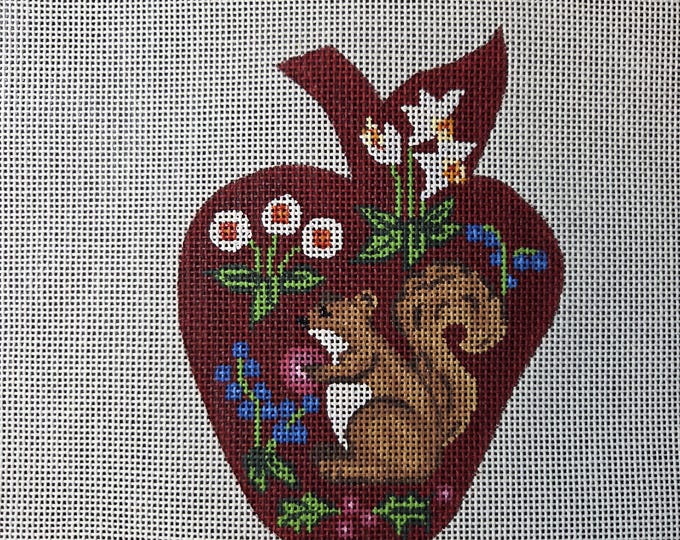 Squirrel in Apple Needlepoint Canvas 18# 4"x5" Apple. Preowned Estate Sale Good Condition. Free Shipping. There is a hole in the upper left.
