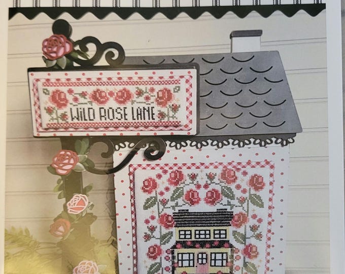 Stitching with the Housewives Wild Rose Lane Cross Stitch Pattern. FREE SHIPPING. Good Condition