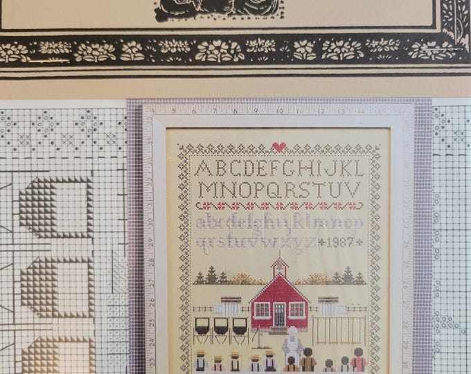 Told In A Garden Schoolhouse Sampler Cross Stitch Pattern. Good Condition. Free Shipping.